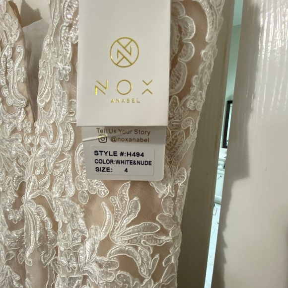 Brand new wedding dress. Last several pictures are from the Nox Anabel web site - Picture 6 of 11